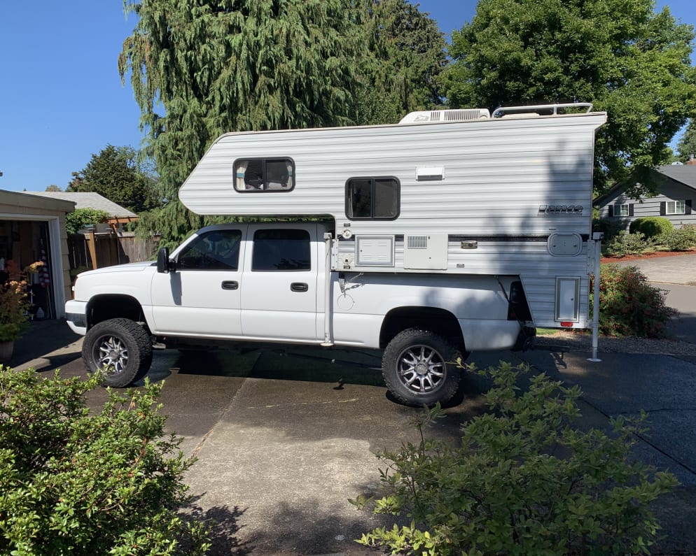 Camper fits on short bed trucks, half-ton or bigger. Will also fit on long bed trucks. 