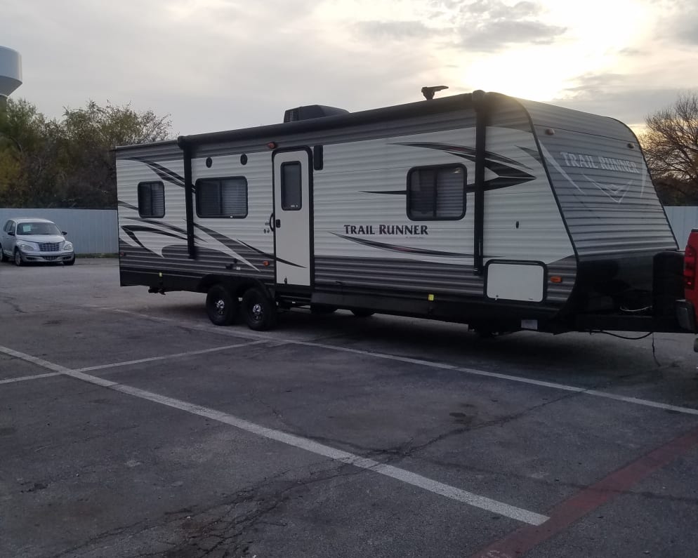 27ft toy hauler . Queen bed up front. Nice shower. Everything like brand new..