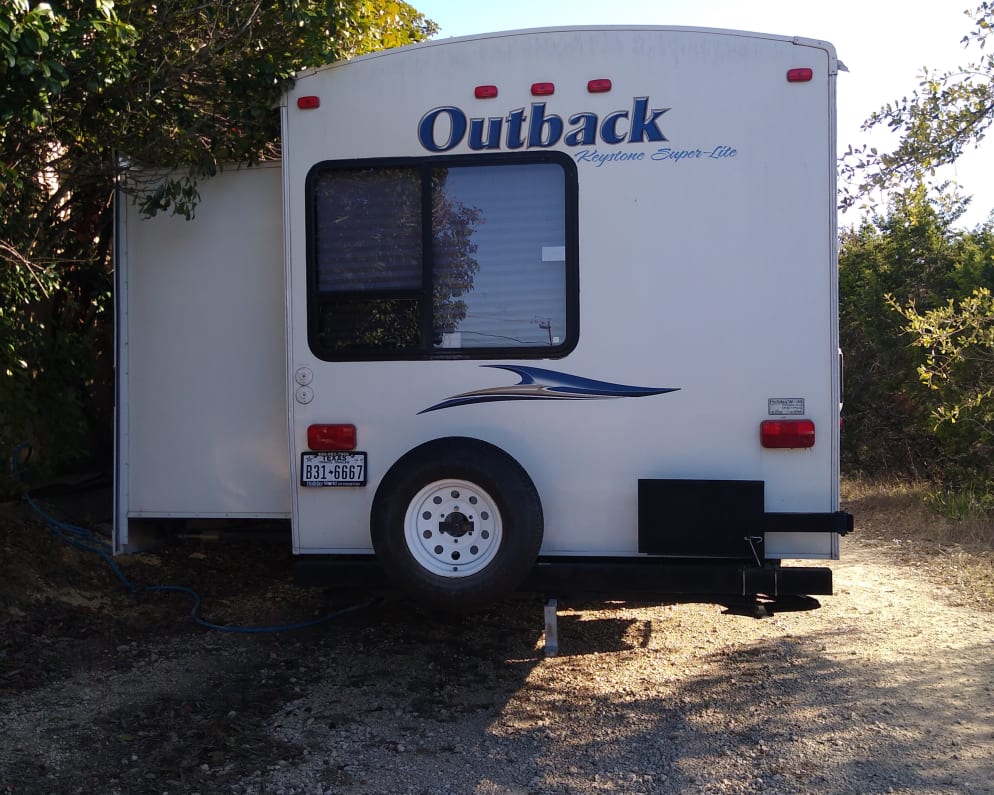 Outside fridge and stove