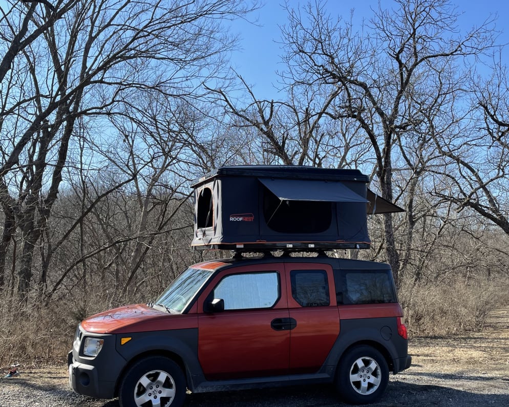 Doesn&#39;t she look like fun? This is our Element Micro Camper, &quot;Orange You Glad&quot; with the roof-top tent set up to camp.