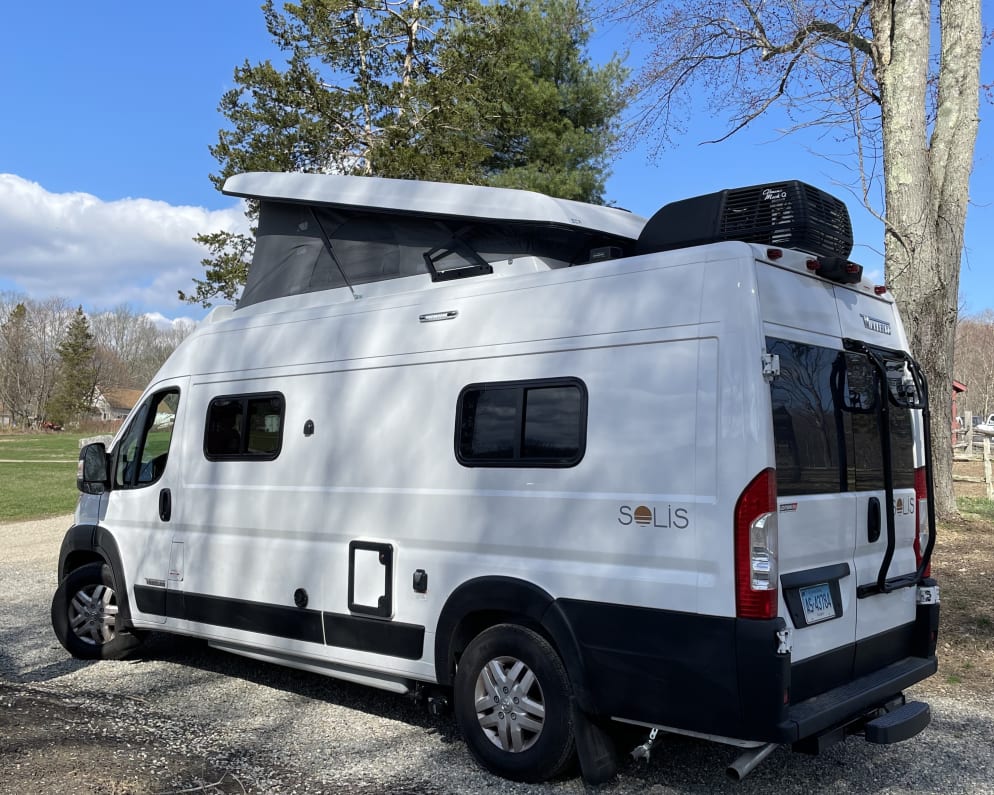 Driver Side with cassette access panel and bike rack