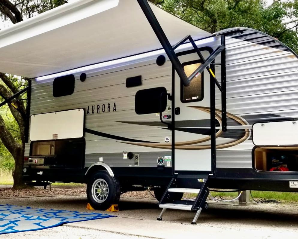 Sure Steps, electric awning with LED lighting, outdoor griddle with extra fridge