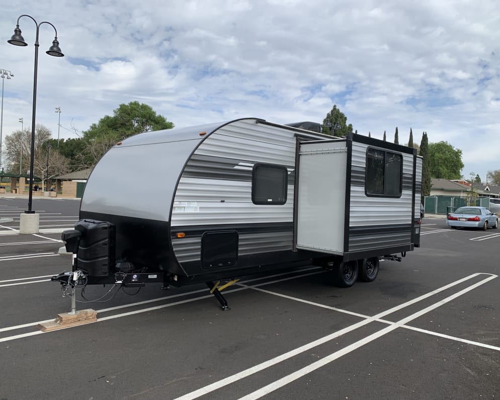 Trailer with driver side slide out