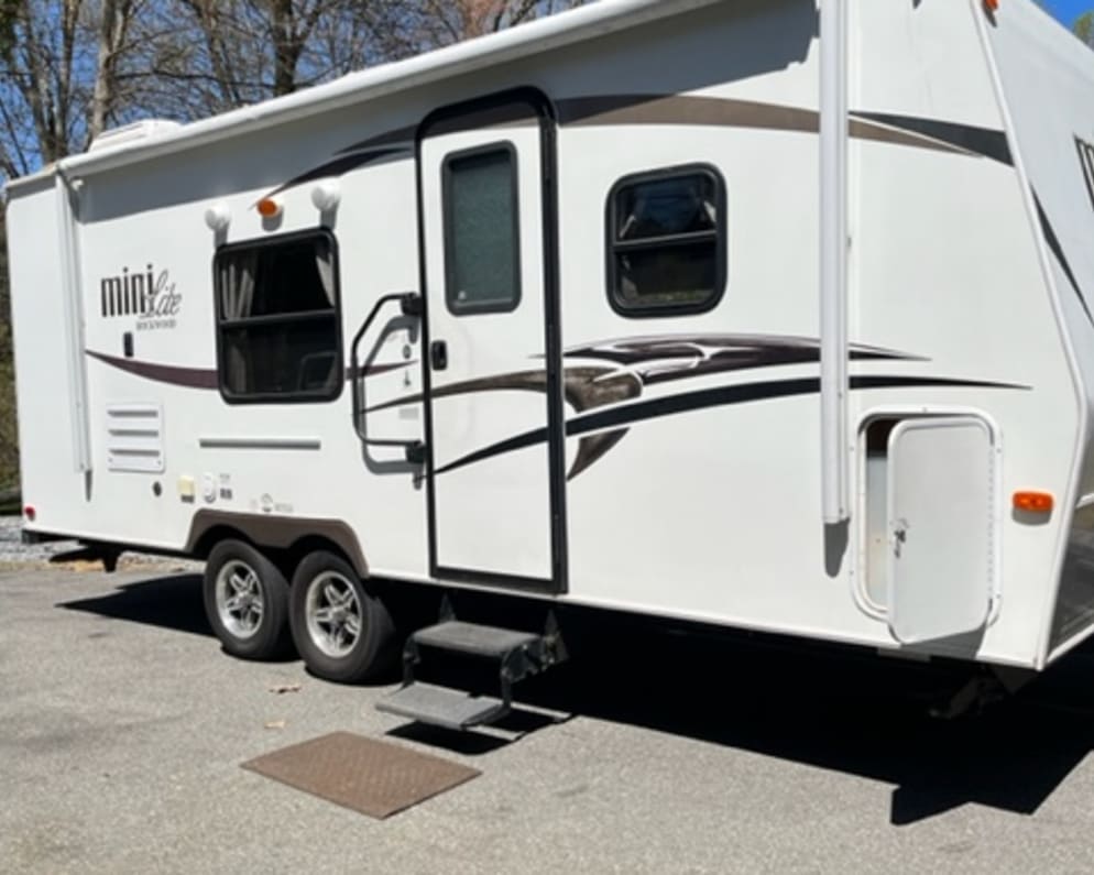 Forest River Mini Lite 23&quot; from hitch to bumper sleeps 6 has large awning is ready to make fun memories