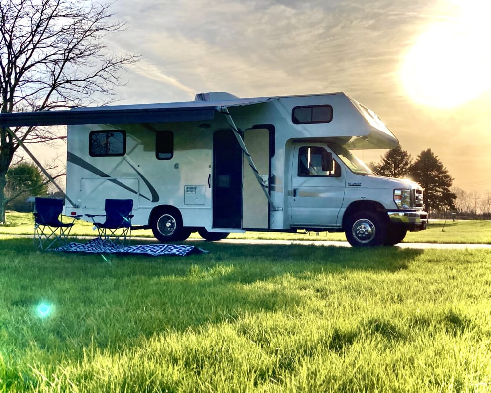 2 Camp chairs and an outdoor rug included.