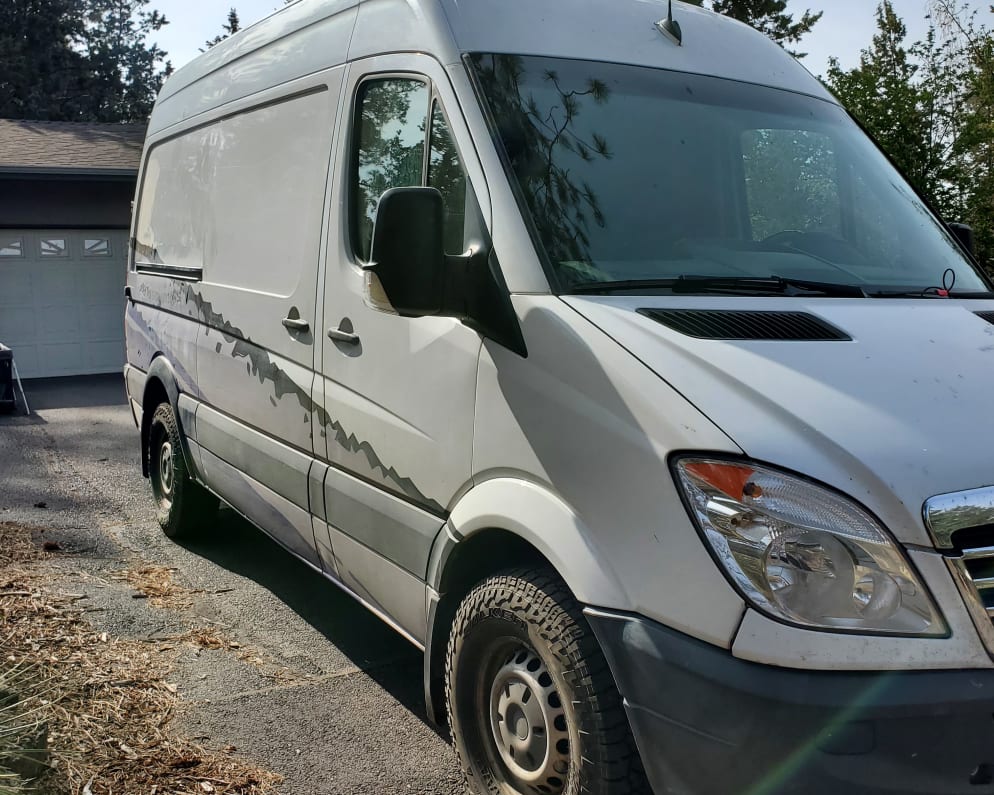 Passenger side exterior.  Great tires and fun wrap.