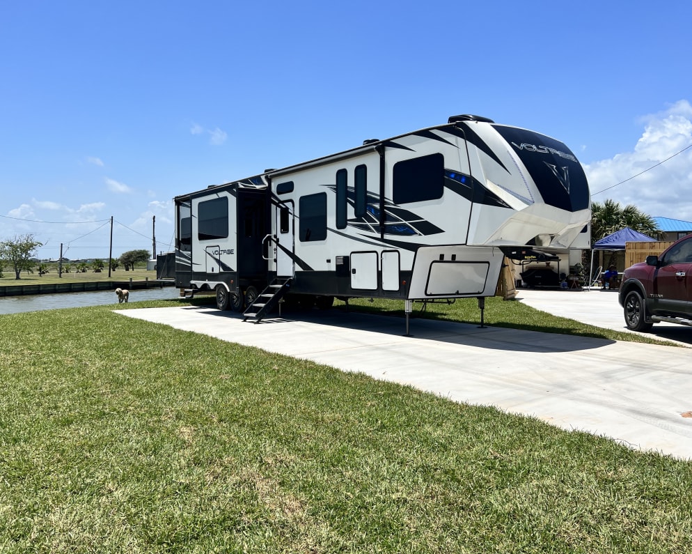 This big beauty sets up quickly and easily in most sites.  We’ll back it right up to water and drop the balcony as close to the water as possible.  The views are always the best from under the back awning.