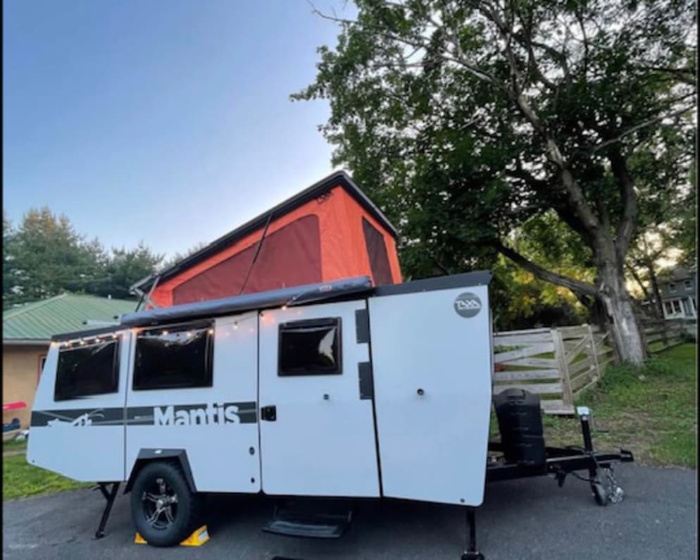 Exterior lights and awning! lovely at a campsite.