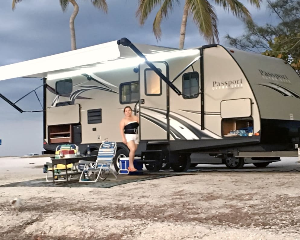 trailer comes with a nice rug or carpet for outside. It has an outside kitchen,  outside shower.  