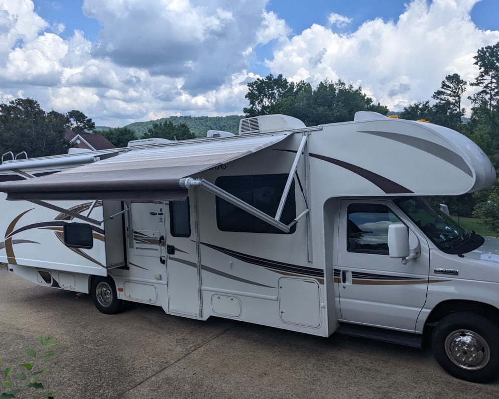 this entertainment side of the rv comes complete with motorized awning and a tv (in front compartment)  Tons of storage for you to bring your &quot;stuff&quot;