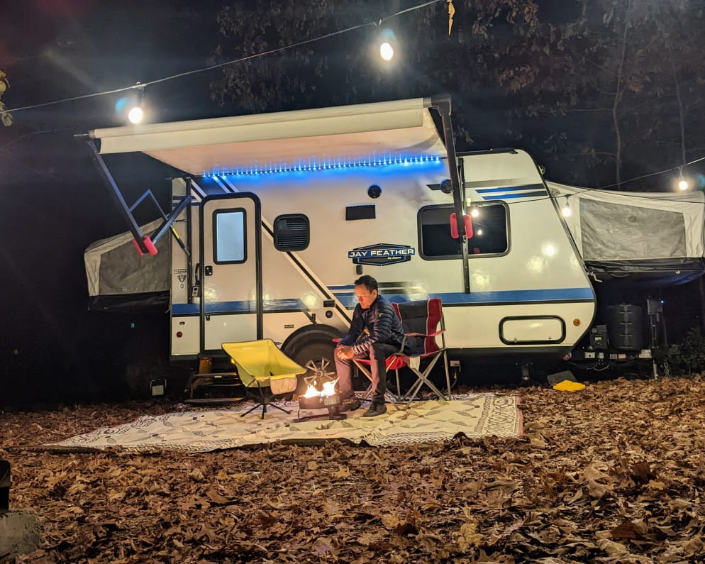 Warm propane fire pit &amp; outdoor string lights makes a perfect ambiance the glamping camping experience.