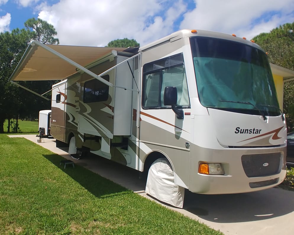 Powered awning, one of three slides