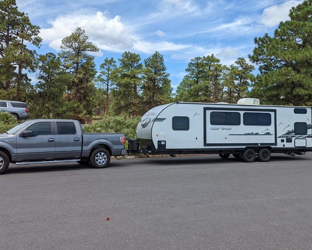 Some half-ton pickup trucks may be able to tow this camper. You must have an electronic brake controller installed and use the sway control hitch.