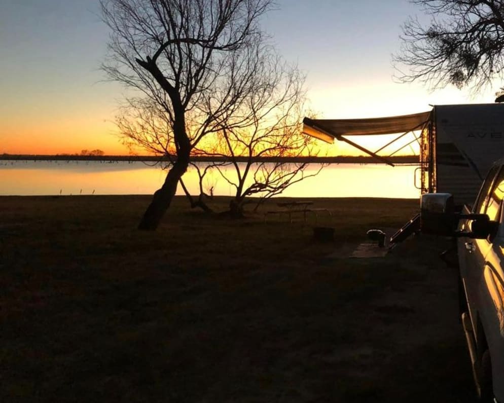 Camping at Mustang Hollow RV park and enjoying the sunset on the lake