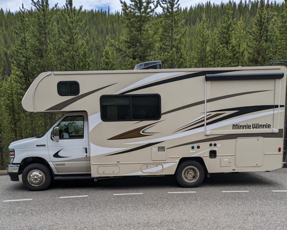 Driver&#39;s side.  Motorhome is 24&#39; 5&quot; long.  Perfect for those many sites that require something under 25&#39;!