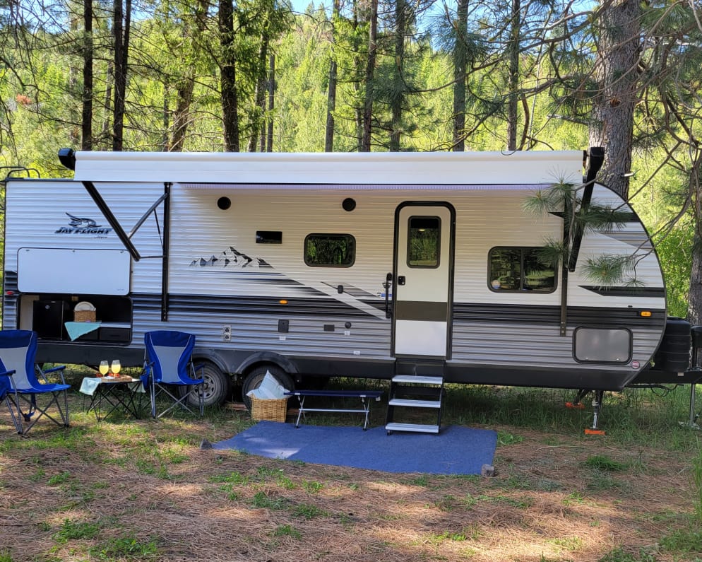 The trailer all set up for a relaxing camping trip!