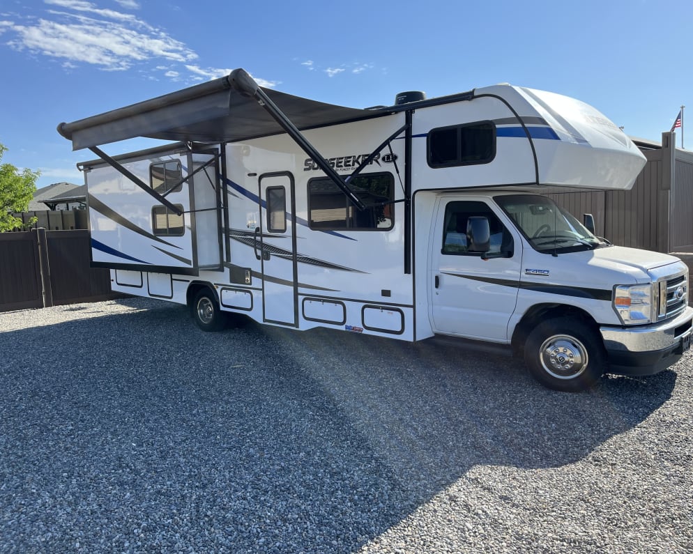 Passenger side with slide outs and awning out. 