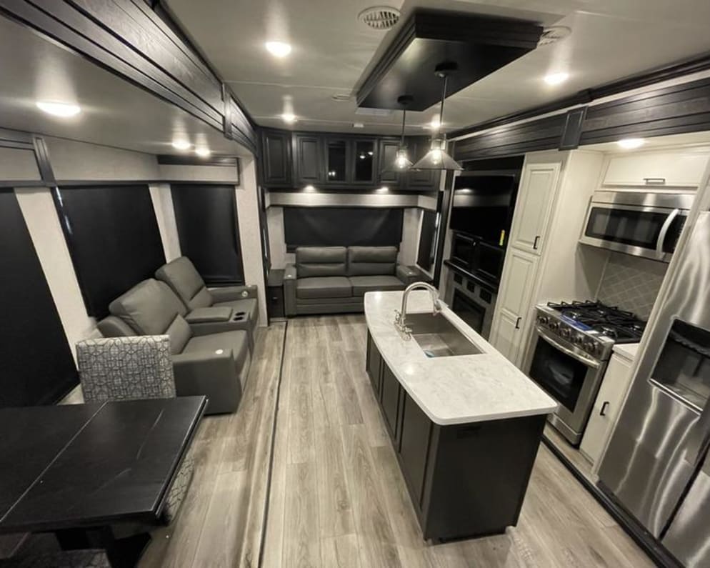 With a residential fridge and Microwave this kitchen and dining area  makes for a true ease of use.