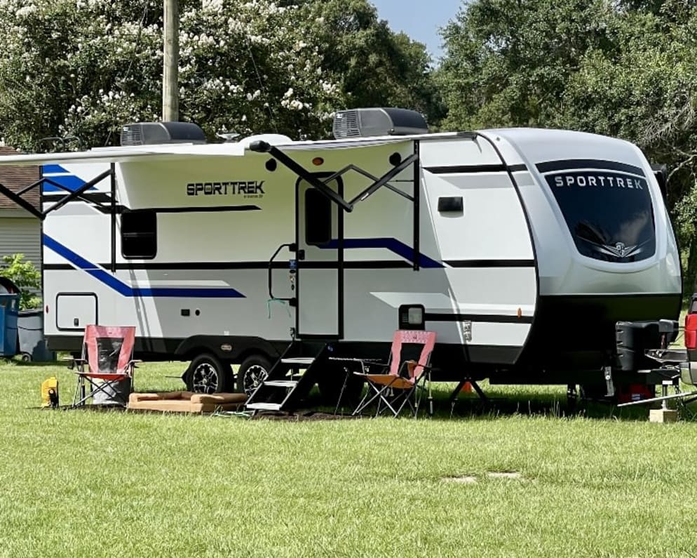 SportTrek with Picture Windows in Front and Back 18ft. Power Awning