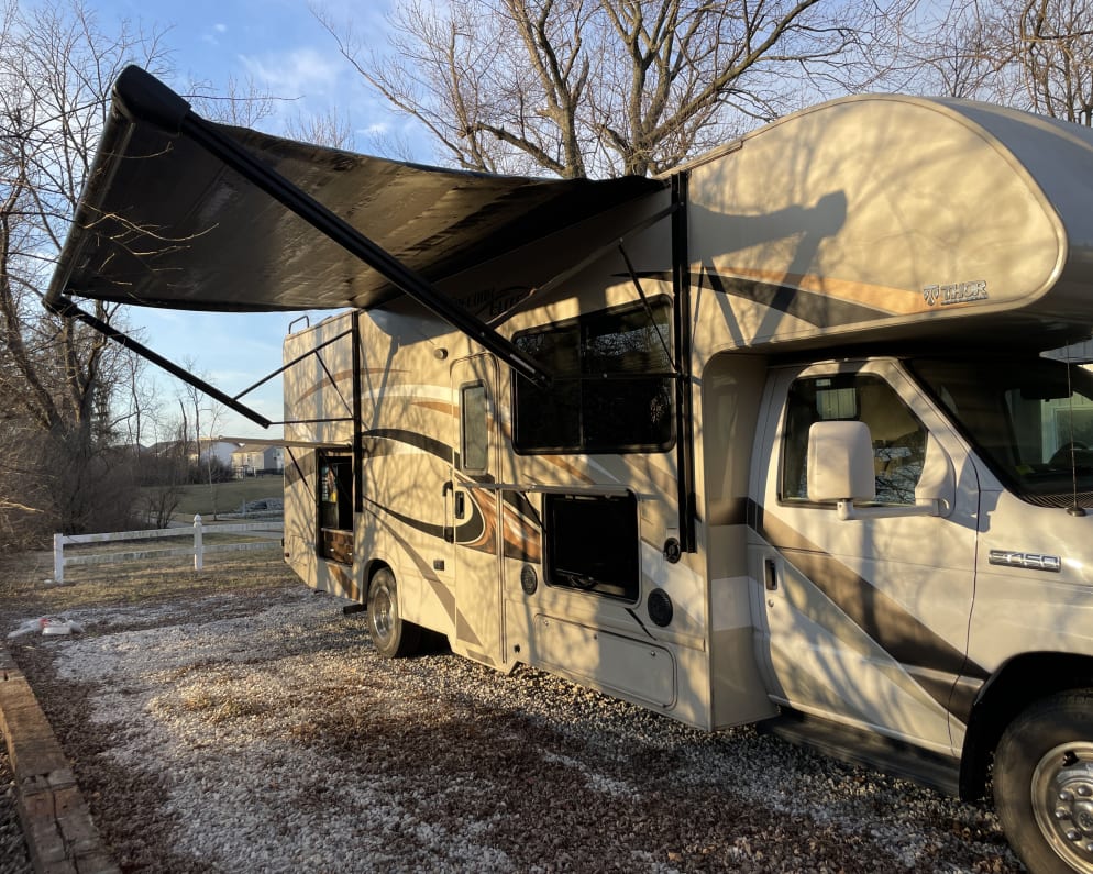 Built for family fun, this RV has an outdoor fridge, sink, and television