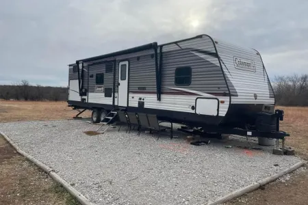 2020 Coleman Lantern includes Separate BH an outdoor kitchen and TV mount.