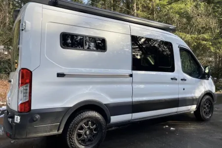 Ford Transit with seating and sleeping for four!