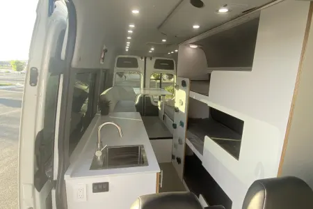 Family Size Mercedes-Benz Sprinter w/ Bunk Beds & Rock Wall