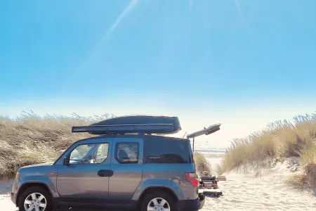 fully equipped solo glamping set up/ AWD Honda Element