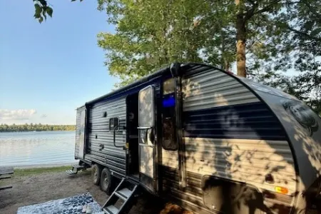 "The Big Dipper" Bunkhouse with bedroom, bunk set, sofa, and dinette