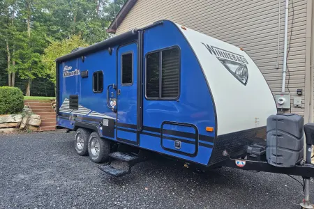 THE MIGHTY BlUE WINNIE