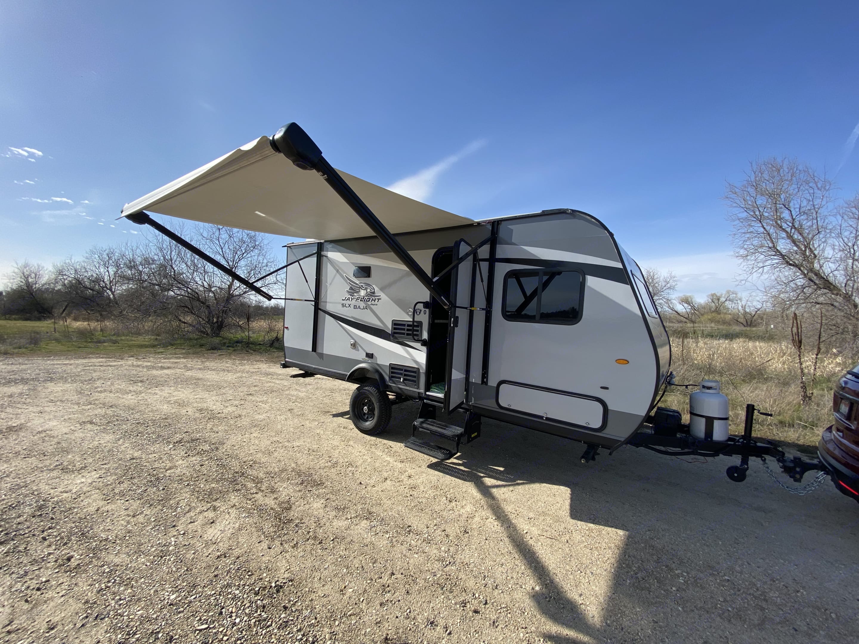 Perfect setup to be outside. 10’ awning with speakers on each arm and LED strip light make a perfect setting for nighttime dance parties!. Jayco Jay Flight SLX Baja Edition 2021
