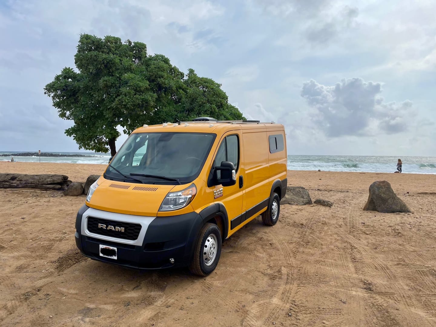 This RV rental includes beach chairs as camping gear. It also comes with kitchen essentials like cookware, plates, bowls, cups, coffee mugs, utensils, and basic spices.