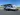 Outside view with awning. Dutchmen Kodiak ultralight 2021