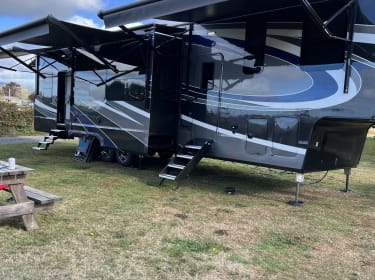 2023 Grand Design Momentum M-Class Toy Hauler Fifth-wheel rental in Silverdale, WA