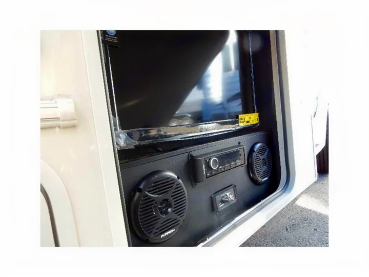 This RV rental features an exterior entertainment system with a flat-screen TV, stereo unit, and two Furrion speakers.. Coachmen Freelander 2017