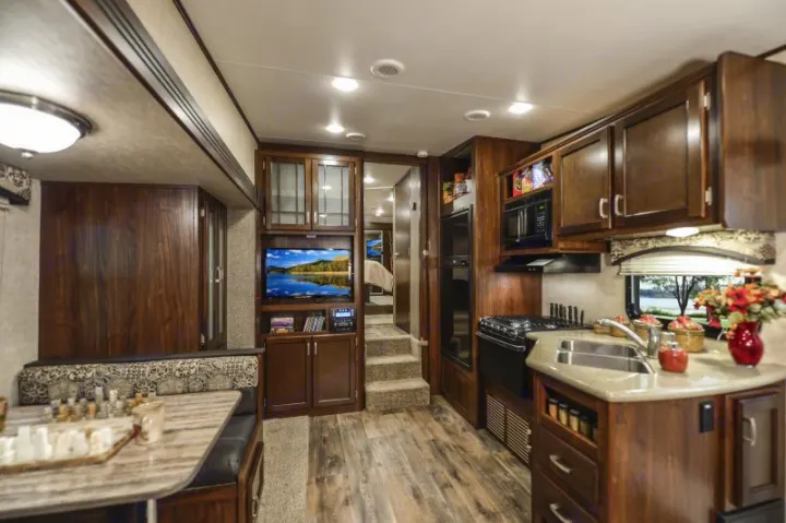 As you enter the rear entrance door looking at the living space. Heartland Sundance 2017