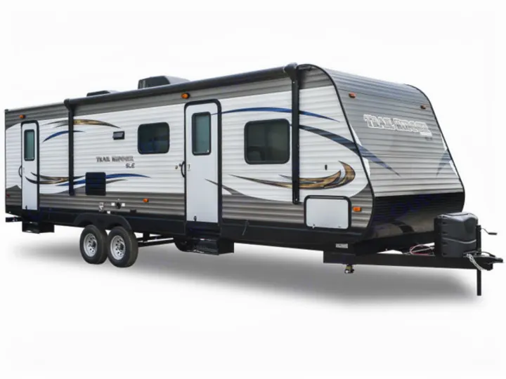 Stylish gray and white Trail Runner SLE travel trailer RV rental, featuring two doors and dual axles. Ideal for road trips.. Heartland Trail Runner 2016