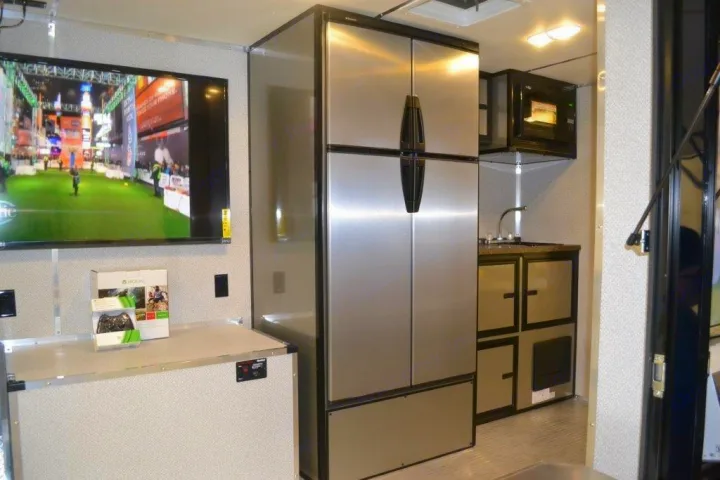 RV rental with full kitchen: stainless steel fridge, sink, microwave. Plus, a TV & Xbox entertainment setup.. Livin Lite GameDay 2016