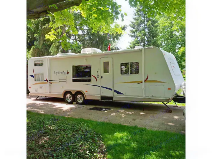 Beautiful inside and out!  Family friendly features...easily sleeps 6-8...flat screen surround sound w DVD and outdooor sound system w aux input!  Air blows cold and large propane tanks supply ample heat,hot water, and cooking....built in microwave, extra large fridge...perfect. Floor plan . jayco jayfeather ultralite 2006