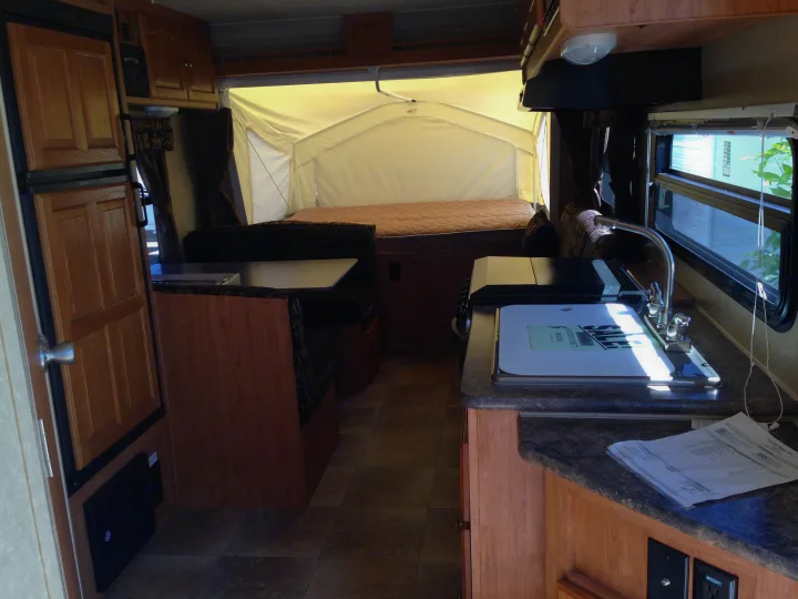 Extra sleeping...Dining table folds down into double bed.  Couch folds out into double bed.  . Rockwood Roo 19L 2011