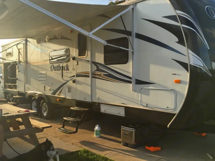 RV with 2 slide outs and 2 doors with retractable awning.. Keystone Outback 2012