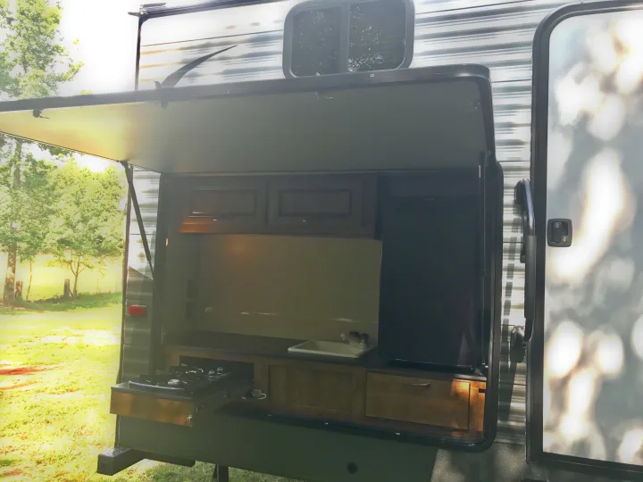 Outdoor Kitchen with stovetop, sink and refrigerator, plus connections for outdoor tv!. Crossroads Z-1 328SB 2017