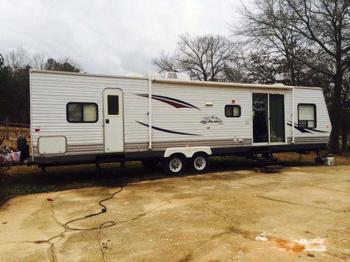 Sliding glass door and back entry into master bedroom. Jayco Jay Flight 2009