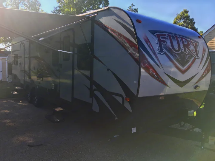 32 ft trailer tows great, especially with motorcycles in the back. Dry its about 7200lbs but it tows better loaded to about 9800lbs. . Prime Time Fury 2910 2016