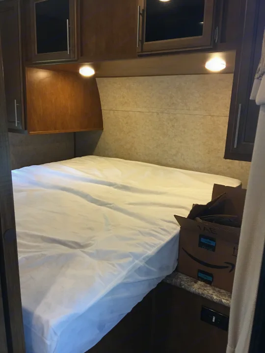 RV queen is actually fairly comfortable to two adults. Closets hang clothes no problem with room to spare. . Prime Time Fury 2910 2016