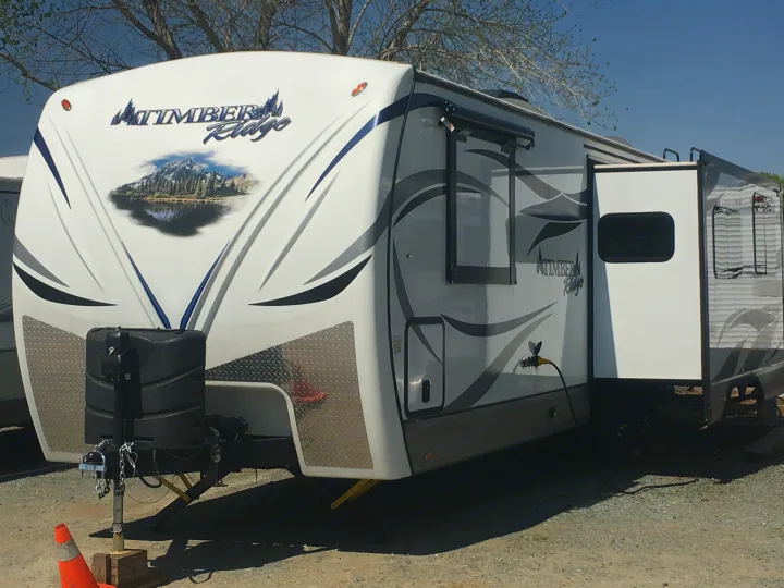 Large trailer with huge slide living room and wardrobe slide. Outdoors Rv Manufacturing Timber Ridge 2016