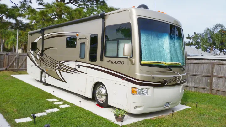 Passenger side
Awning & 32" TV. Thor Motor Coach Palazzo 2013