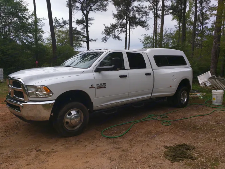 RAM 3500 Dually 4x4 Automatic Diesel with ARE topper. RAM 3500 4x4 Dually 2015