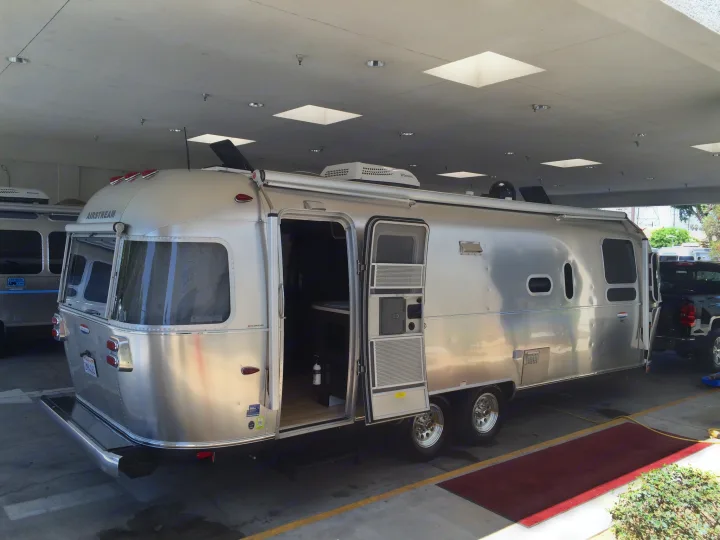 Custom windows for bathroom, electric awning, awning package, satellite dish on roof, skylights, upgraded tvs,, many more options.... Airstream International 2014