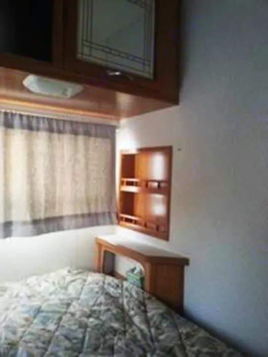 Roomy bed, 2 shelves for personal items, blackout curtains and blinds.. Shasta Other 2002